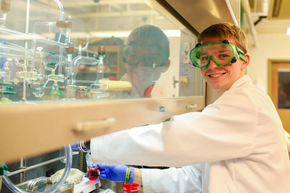 A student conducting an experiment in the lab